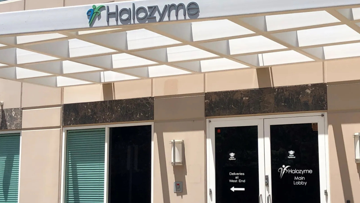 Exterior view of Halozyme building featuring logo above main entrance.